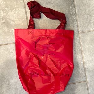 Athleta x Alicia Keys red reusable bag. With 2 pouch bags